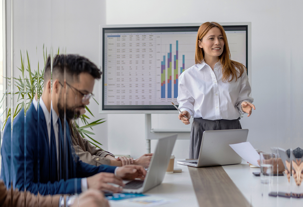 Businesswoman presenting data in meeting